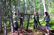Participants of the expedition examine the collapsed arangas (Vilyuisky region), 2006.