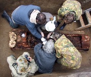 Clearing of the buried body (Burghunnyakh II burial, Suntar region, 2008)